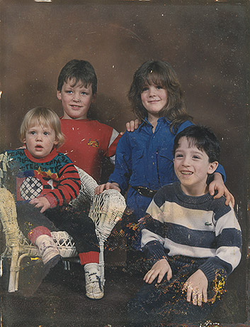 Photo Restoration of 4 siblings in a family group photo Unrestored damaged original